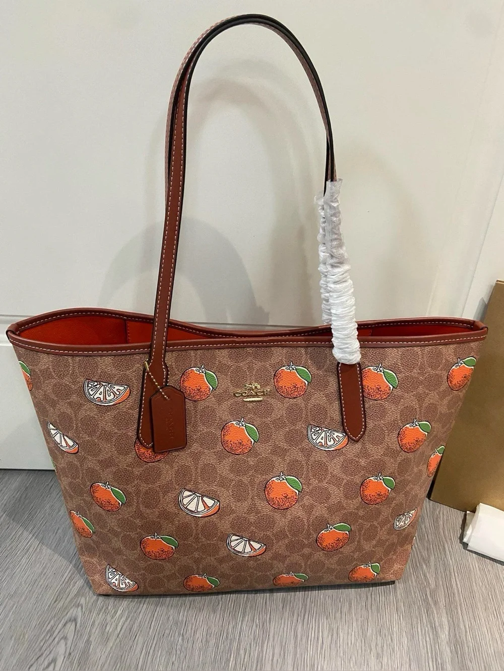 Coach Brown Canvas Tote with Orange Fruit Print